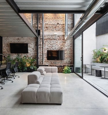 Interior Design of an Office integrating natural elements with furniture .