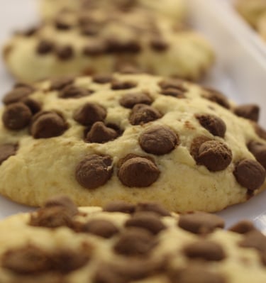a tray of cookies and chocolate chips on a tray