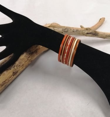 a handmade bracelet bracelets with orange bangles