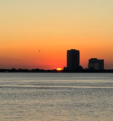 Sunset over Lake Pontchartrain taken by Genevieve Fynnys
