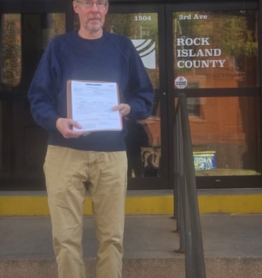 Steven Rugh at the County Office to turn in his Petition Packet.