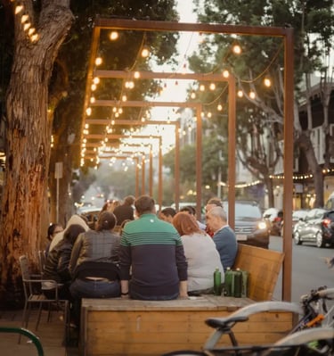 Individuals participating in a reflective group conversation event