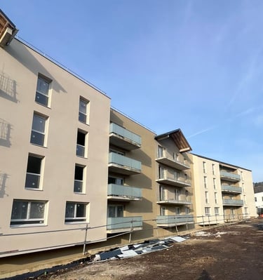 a person walking down a street with a red truck