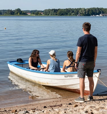 Children engaged in a lively environmental education session about local wildlife and lake preservation.