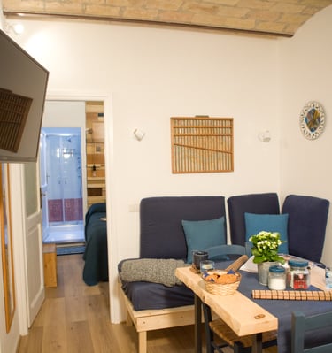 Cozy living area in a central Rome holiday home Studio Paolina