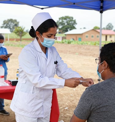 Healthcare professionals collaborating with local hospitals in a vaccination campaign.
