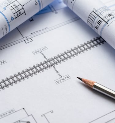 Technical drawing and 3D model of a tram component displayed on a computer screen.