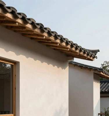 Evening view of a completed building with illuminated windows highlighting its solid structure.