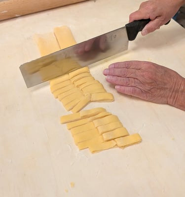 Pasta making at a home cooking experience in Torino