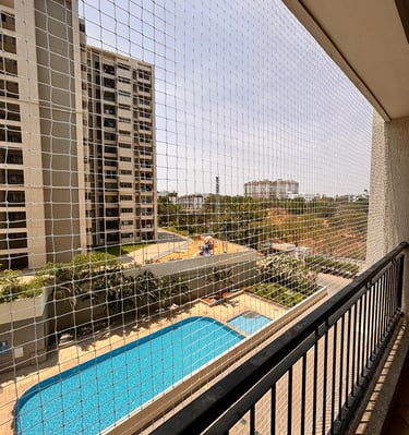 Wide shot of a sports net securely fitted over a playground area.