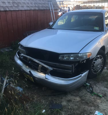 Car with bumper and frame damge