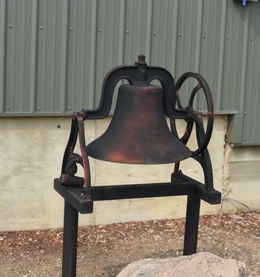 The Red Willow Bell that stands in front of the Red Willow Community Hall