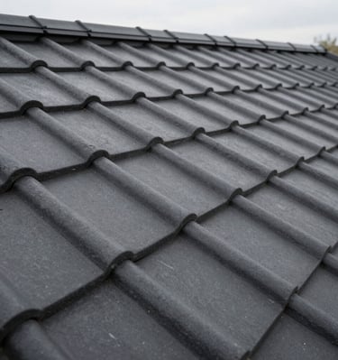 Matte black metal fixtures contrasting against warm beige textured wall panels.