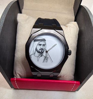 Luxury black watch with a white dial featuring a portrait of Sheikh Zayed in a presentation box.