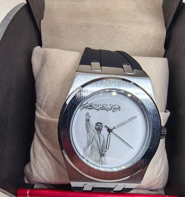 Luxury wristwatch with a portrait of Sheikh Mohammed bin Rashid Al Maktoum on the dial.