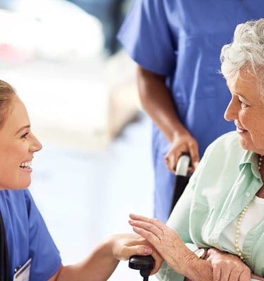 a nurse and a nurse in scrubs