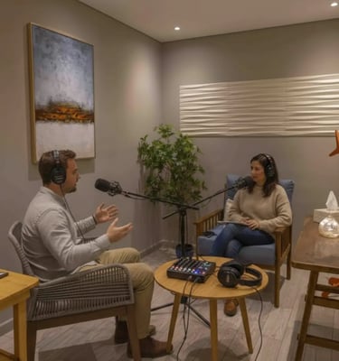 a man and woman sitting in a room
