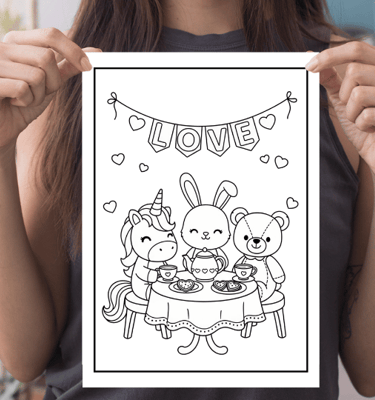 a woman holding a card with a drawing of a cartoon character