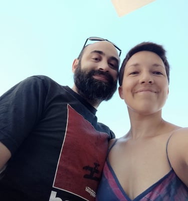 A couple standing next to each other