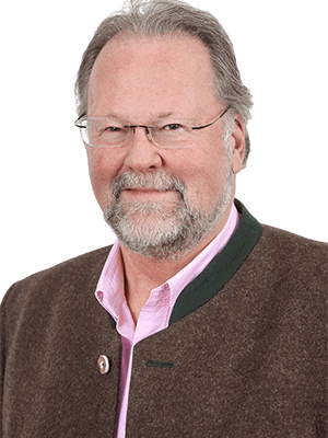 Dr. Heinik, Sportmediziner undPraxisgründer der Hausarzt-Praxis Weidenbusch in Kirchheim bei München