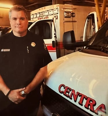 2014 picture of Tim Nangle in uniform, at fire station