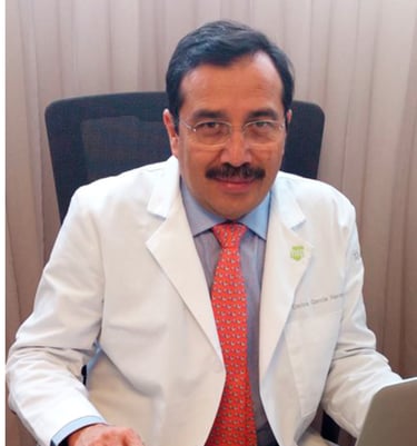 a man in a white lab coat and a laptop