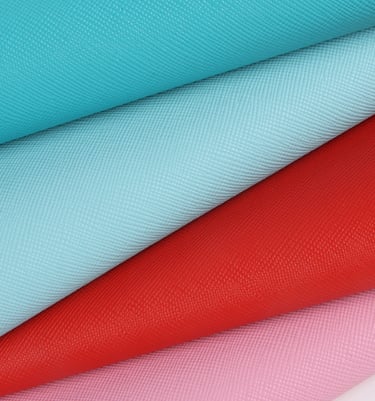 Colorful PU and vegan leather options, offering a luxurious feel for premium bags.