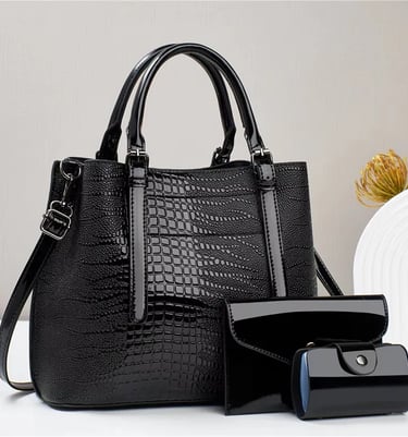 a black purse with a wallet and a wallet