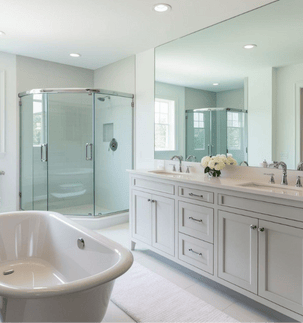 a bathroom with a tub tub and a large mirror