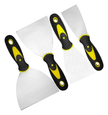 Set of four stainless steel putty knives with ergonomic yellow and black handles for home repair.