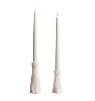 Set of white candle holders for minimalist dining room decoration