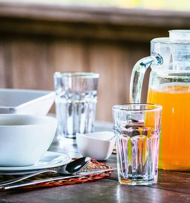 Bed & Breakfast with orange juice in a Hostel.Small Tourism Business Support