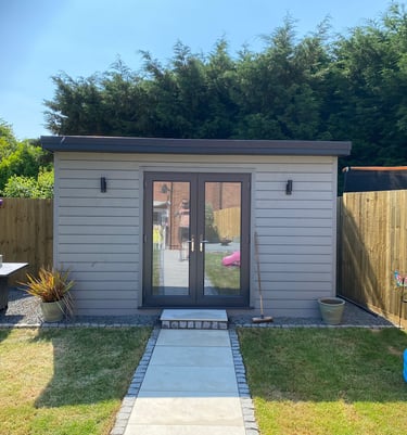 grey wooden garden room in malvern