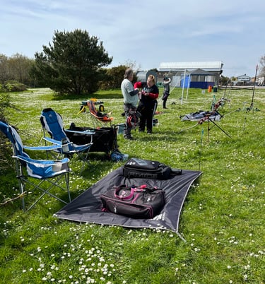 a group of archers getting ready to start shooting