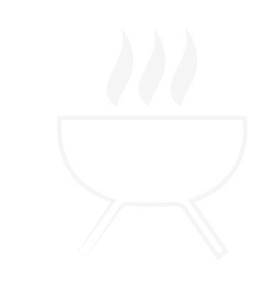 Un barbecue à bois et charbon dans le jardin