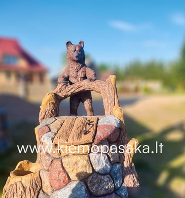 betoninis šulinys-šulinio apdaila su meškiuku