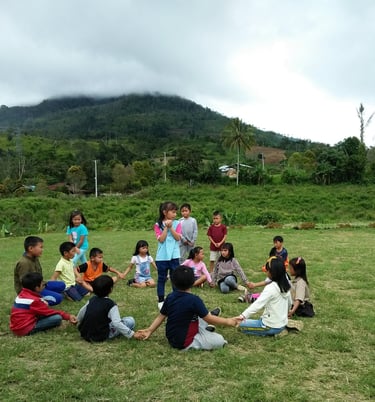 a group of people sitting around a circle of people