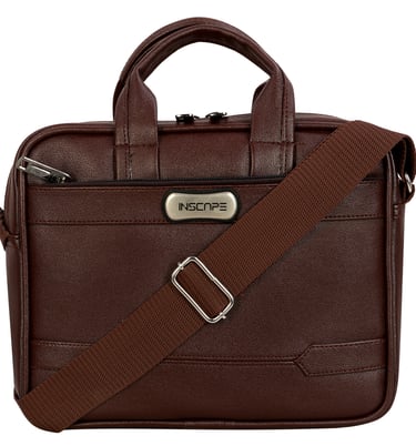 a brown briefcase sling bag with a brown strap