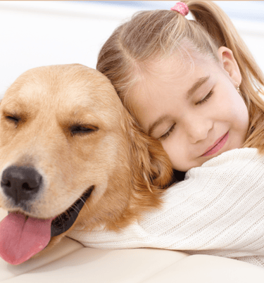 a girl with her golden retriever