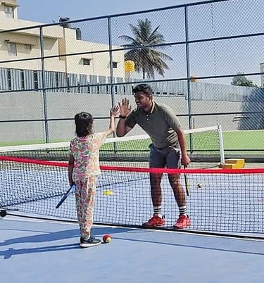 Coach Rohan Working with Red Ball Player
