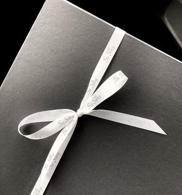 minimal gift packaging white ribbon