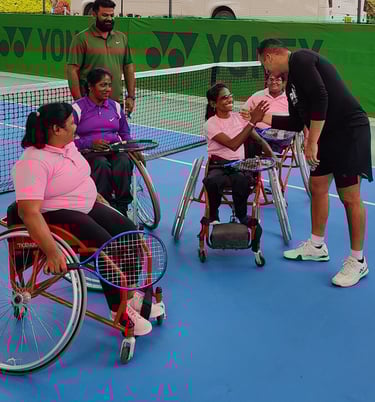 Wheelchair tennis women player working with Cesar Performance Coach