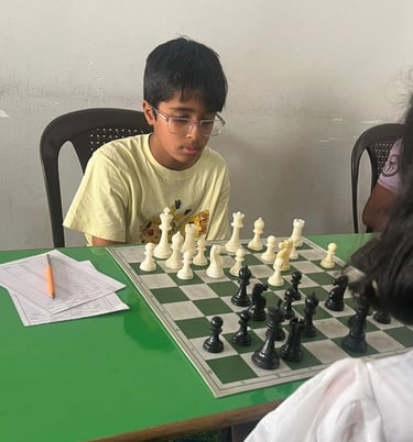 Intermediate level kid playing chess