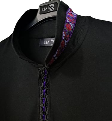 a black polo with a purple tie and a black tie polo con tirolese sardo