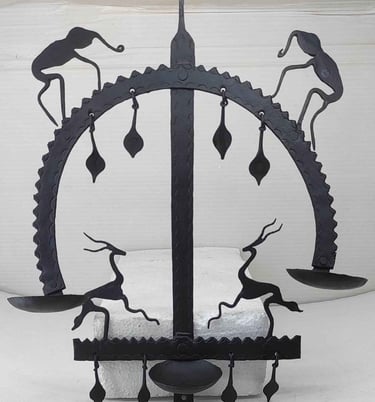 "Tribal oil lamp with elephant face pattern–iron hanging light-Export-ready"
