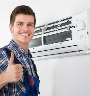 a man in overalls and overalls, holding a thumbs up