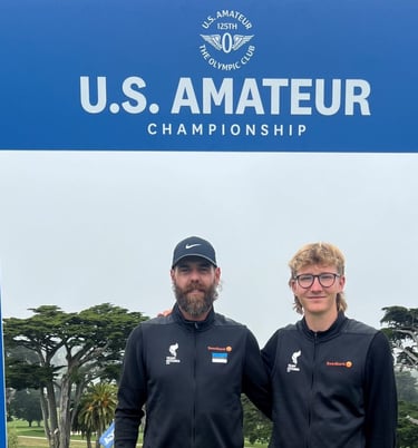 a man and woman standing in front of a us amateur team