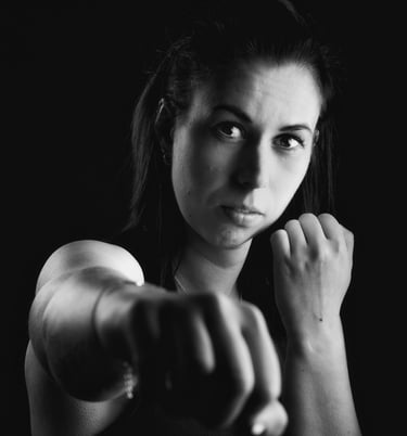 portrait of a woman with a fist