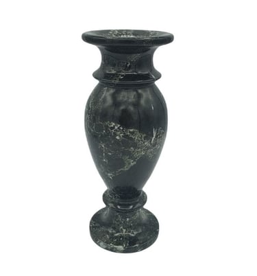 a black marble vase with a marbled vase