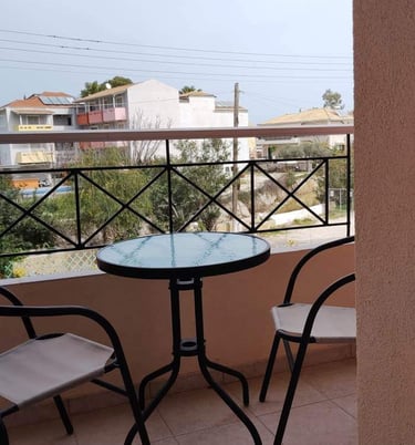 balcony witha table with chairs 